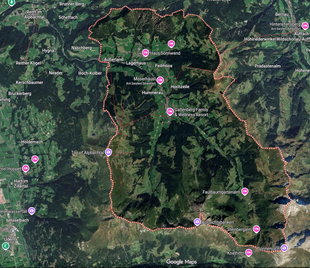 Google Maps satellite view of the Alpbach municipality outlined with a dashed red line, with places like Außerland, Hummerau, Top of Alpbachtal, Aussichtsbankerl and Sonnenjoch around the edge