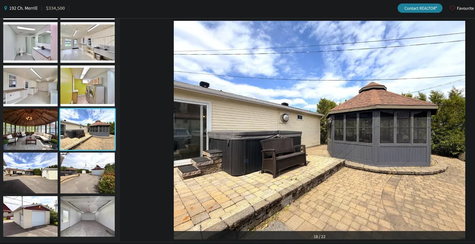Listing image 18/22 in the REALTOR.ca gallery for 192 Ch. Merrill: the same grey gazebo on the same stepped paver patio with the same stone retaining wall — plus the hot tub the artifact frame just misses.
